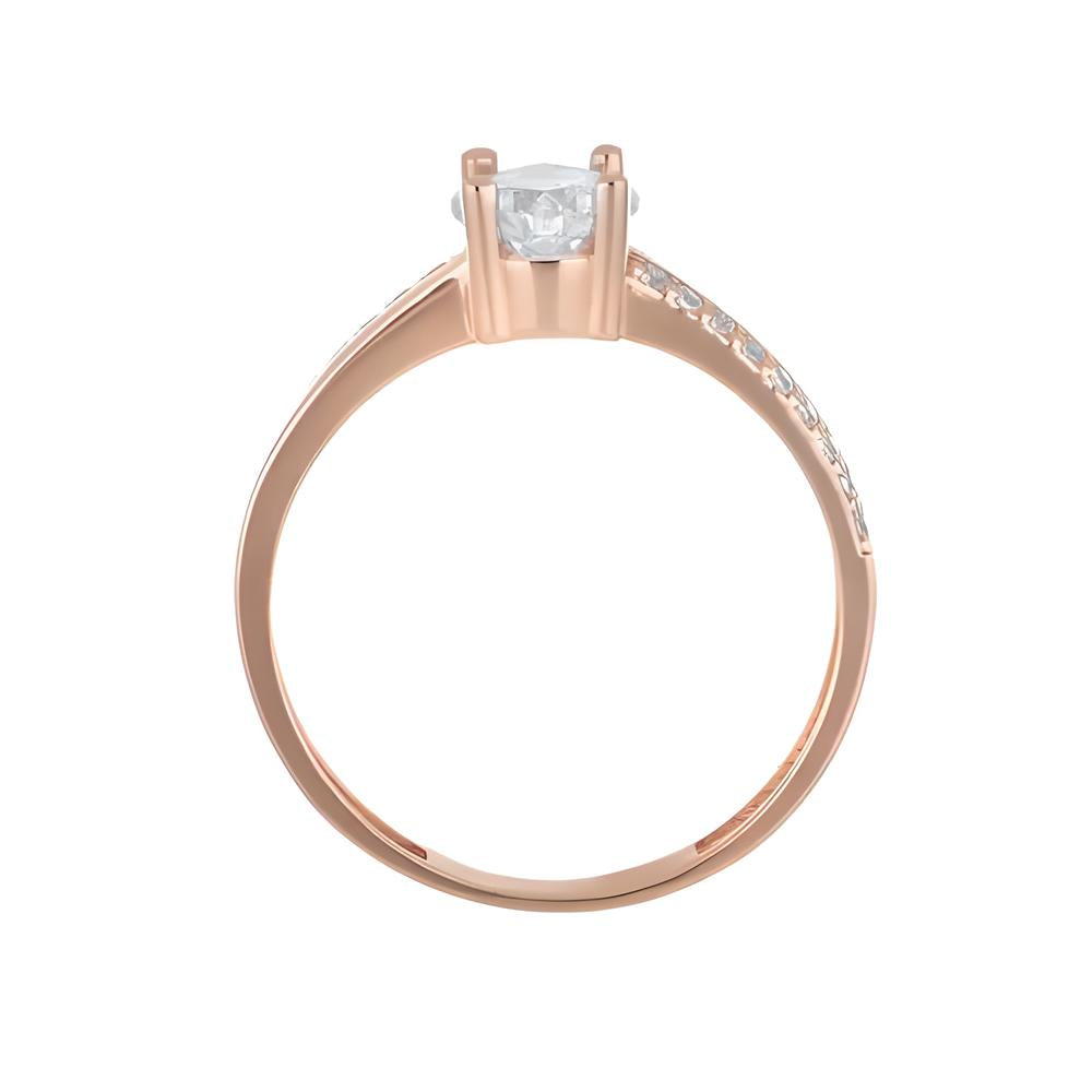 Gold solitaire ring with line of zirconias